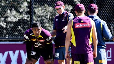Tevita Pangai Jr takes instructions from former coach Wayne Bennett during their time together at the Brisbane Broncos in 2018.